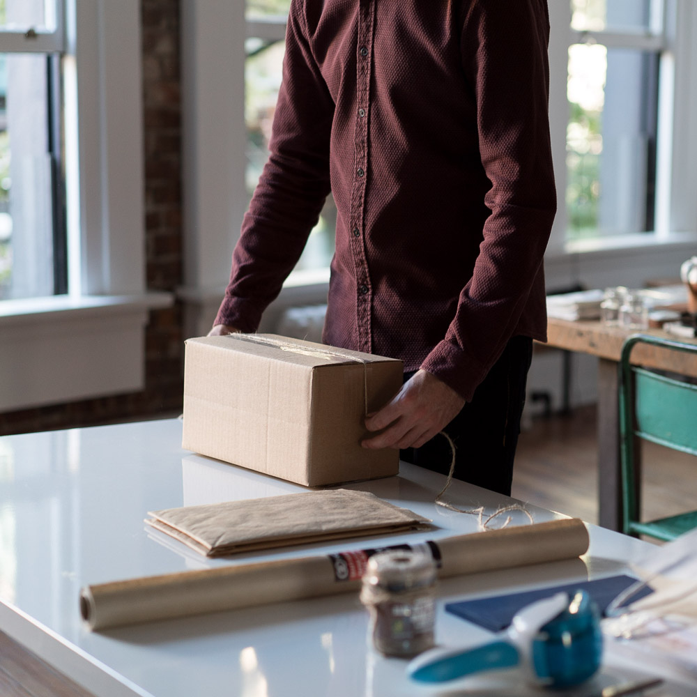 person folding box